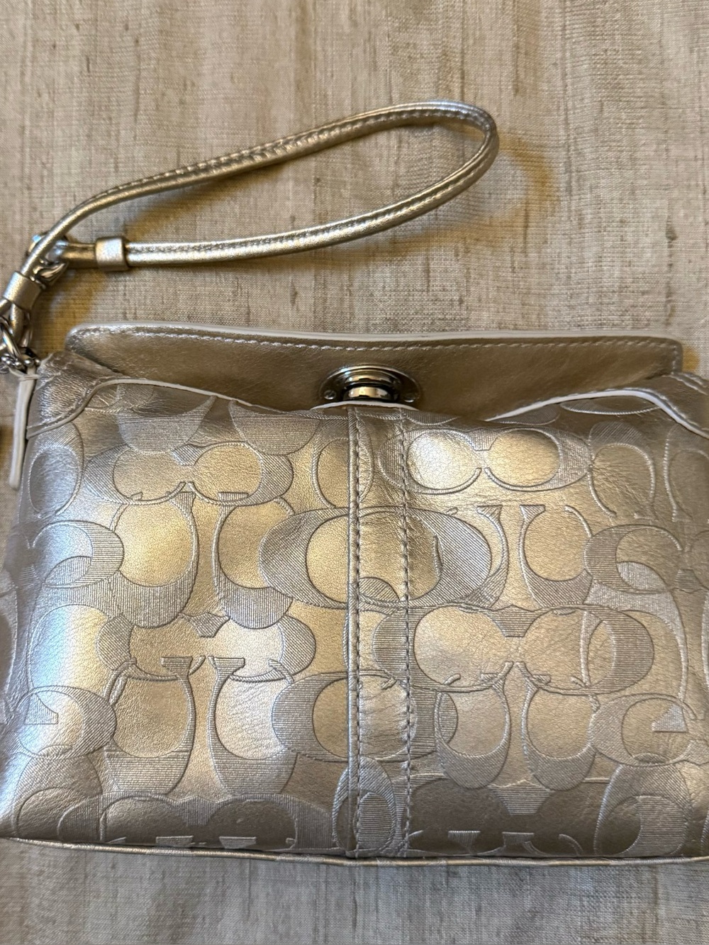 NWT Coach Vintage Gold Metallic embossed Signature Wristlet F42808